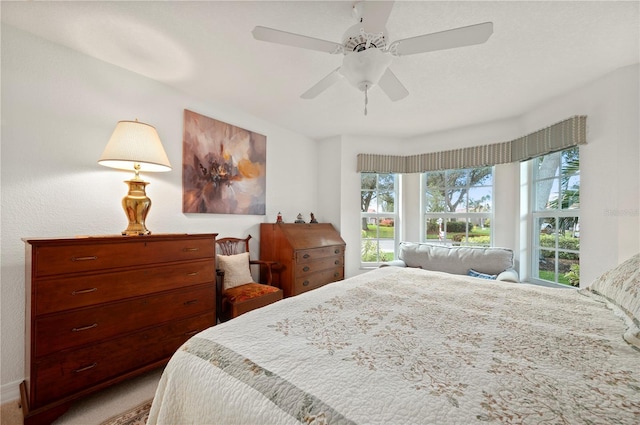 bedroom with carpet flooring and ceiling fan