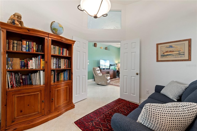 sitting room featuring light tile patterned flooring