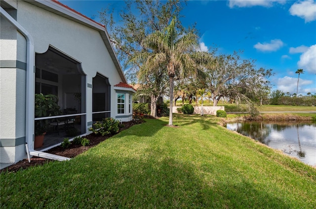 view of yard featuring a water view