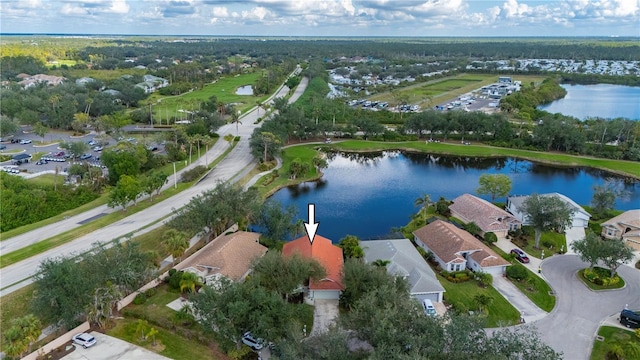 drone / aerial view with a water view