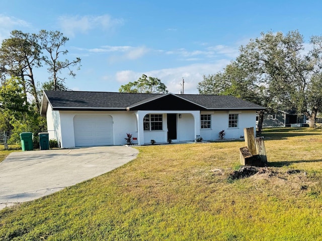 ranch-style house with a garage and a front yard