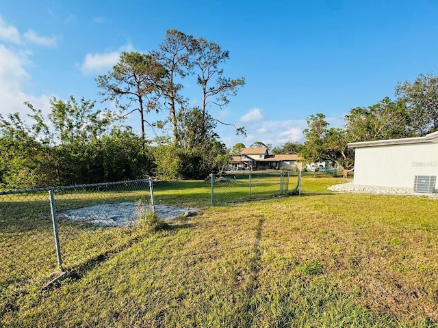 view of yard featuring central AC