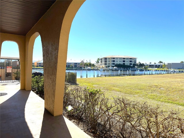 view of patio with a water view