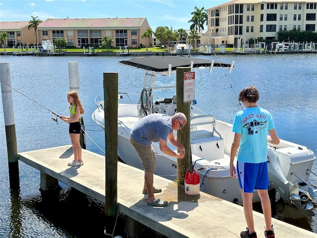 dock area featuring a water view