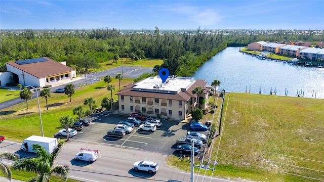 birds eye view of property featuring a water view