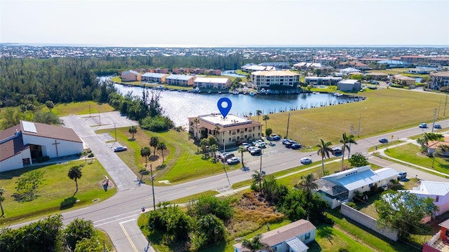 bird's eye view with a water view