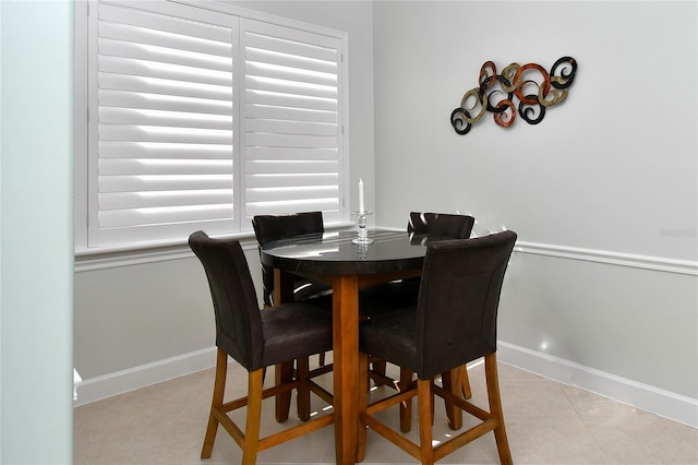 view of tiled dining area