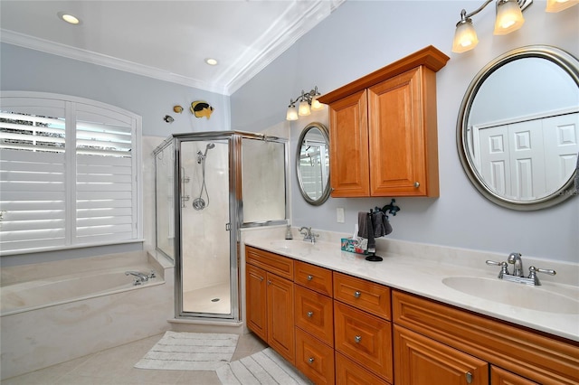 bathroom featuring vanity, crown molding, tile patterned flooring, a wealth of natural light, and independent shower and bath