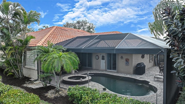 view of pool featuring a patio and a lanai