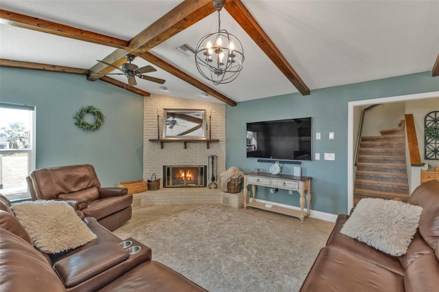 living area featuring visible vents, stairway, baseboards, a brick fireplace, and vaulted ceiling with beams