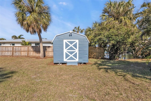 view of shed featuring a fenced backyard