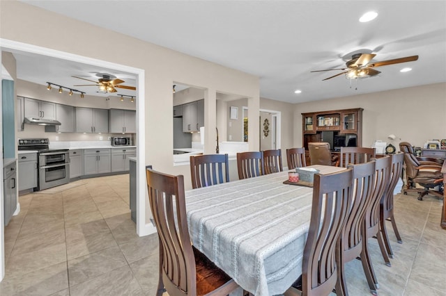 dining area with recessed lighting, track lighting, a ceiling fan, and light tile patterned floors