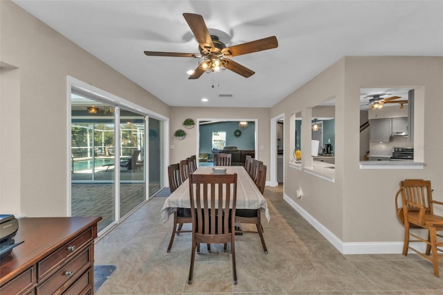 dining room featuring visible vents and baseboards