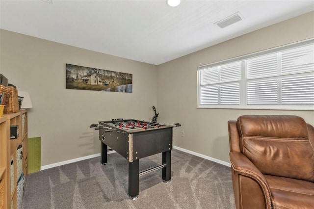 rec room with visible vents, baseboards, and carpet floors