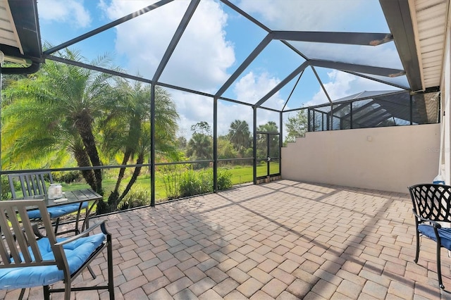 view of patio / terrace with glass enclosure