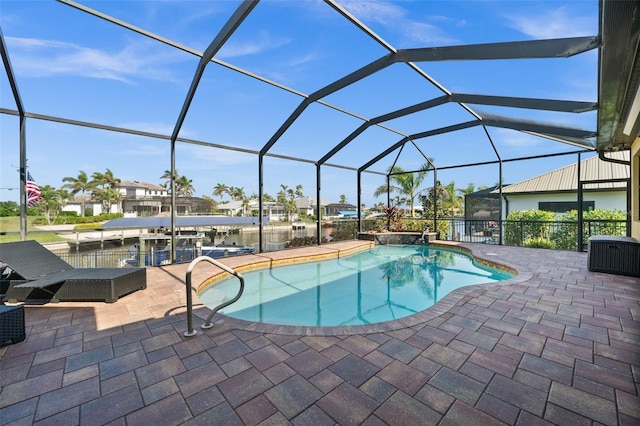 view of swimming pool with a boat dock, a patio, and glass enclosure