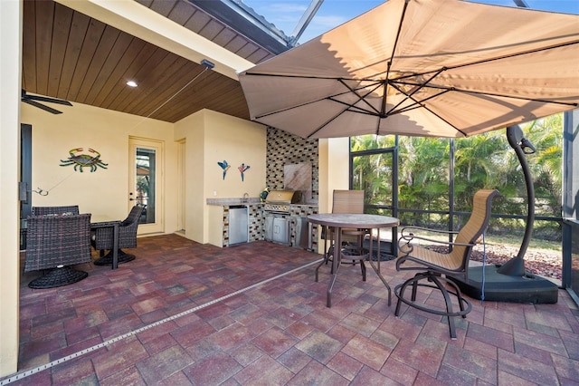 view of patio featuring grilling area and exterior kitchen