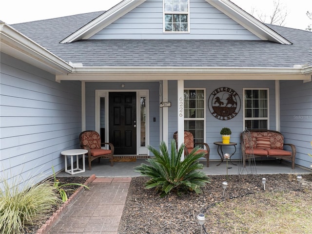 property entrance featuring covered porch