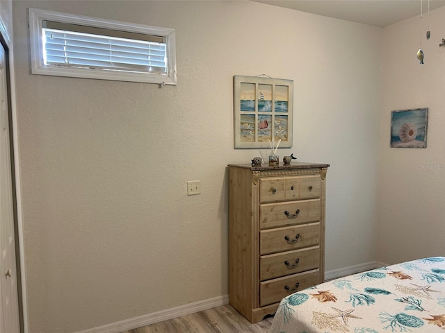 bedroom featuring light wood-type flooring