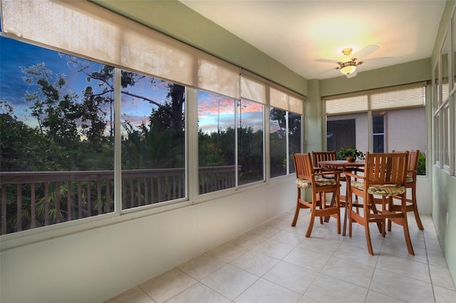 sunroom / solarium with ceiling fan