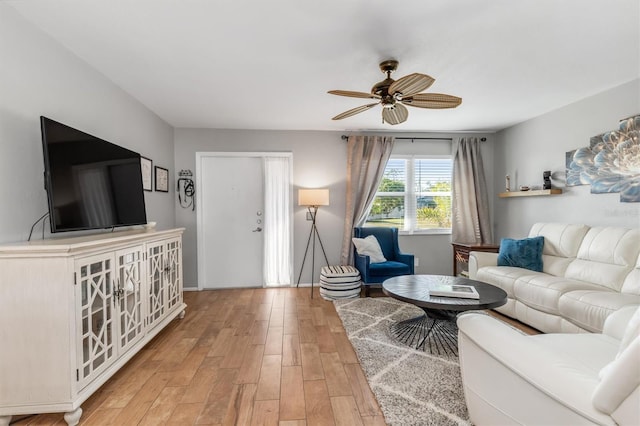 living room featuring ceiling fan