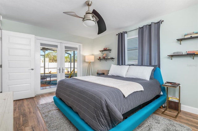 bedroom with french doors, hardwood / wood-style floors, access to exterior, and ceiling fan