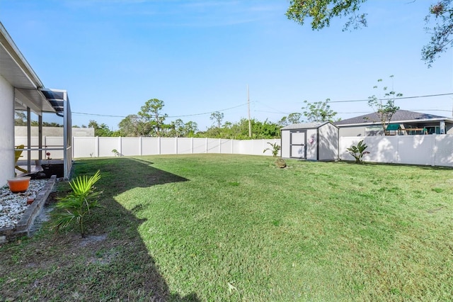 view of yard with a storage shed