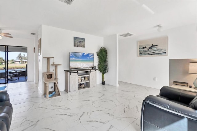 living room with ceiling fan