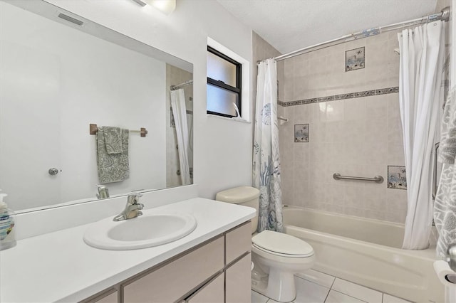 full bathroom with tile patterned flooring, toilet, shower / tub combo, a textured ceiling, and vanity