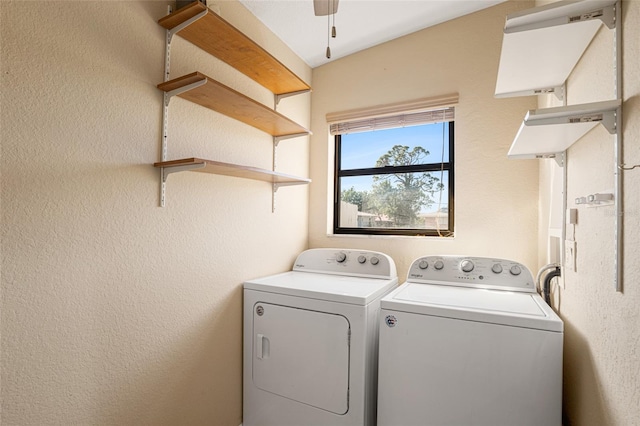 laundry room featuring washer and clothes dryer and ceiling fan