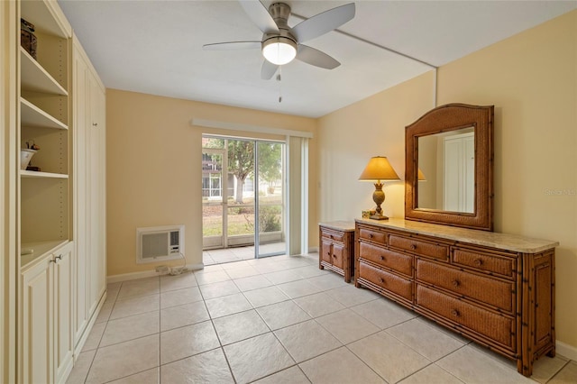 living area featuring ceiling fan and light tile patterned flooring