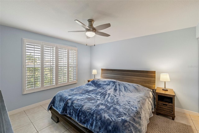 bedroom featuring ceiling fan and light tile patterned floors