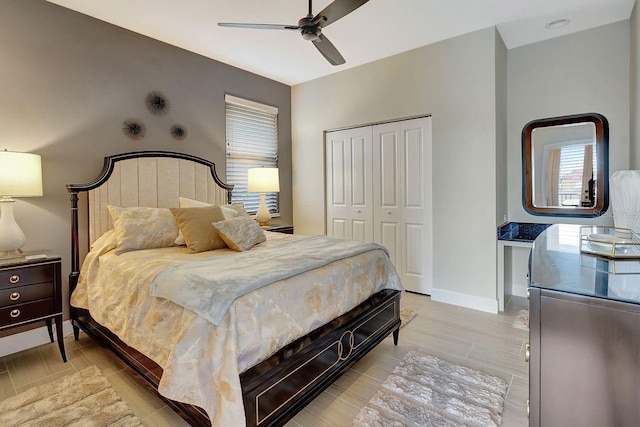 bedroom with a closet and ceiling fan