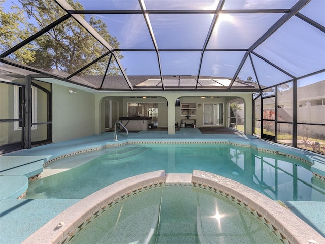 3341 Briant St, North Port, FL 34287 - view of pool featuring a patio, a pool with connected hot tub, and a lanai