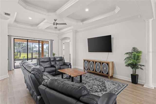 living room featuring ceiling fan, ornamental molding, and coffered ceiling