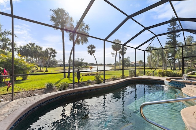 view of swimming pool with an in ground hot tub and a lanai