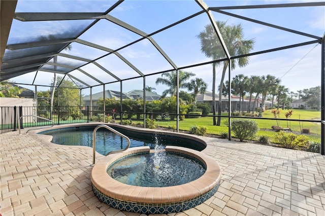 view of swimming pool featuring a lanai, a patio area, and an in ground hot tub