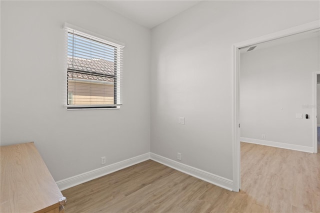 unfurnished room featuring light wood-type flooring