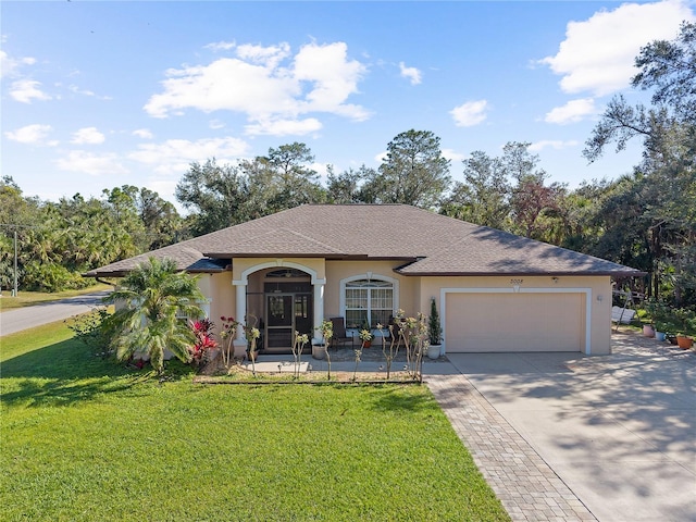 ranch-style house with a front yard and a garage