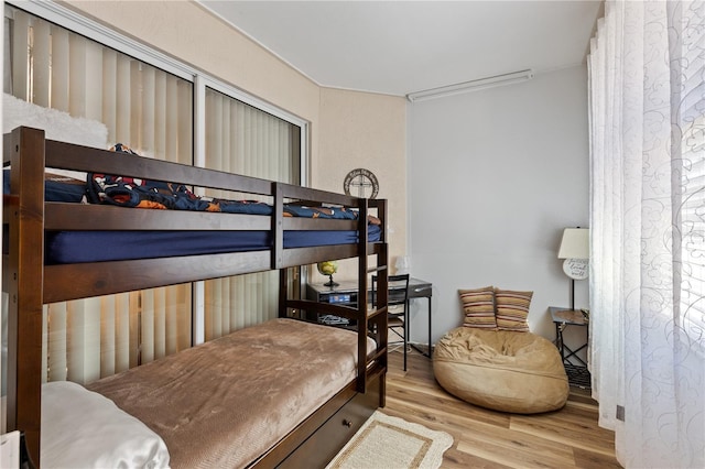 bedroom featuring light wood-type flooring