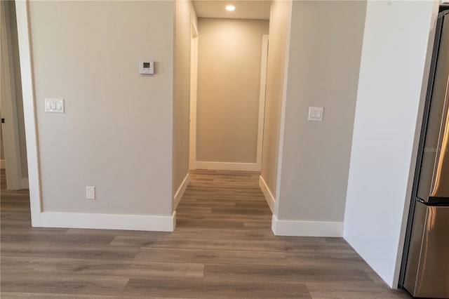 hallway featuring hardwood / wood-style flooring