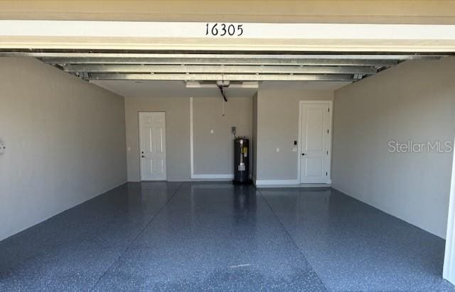 garage featuring water heater