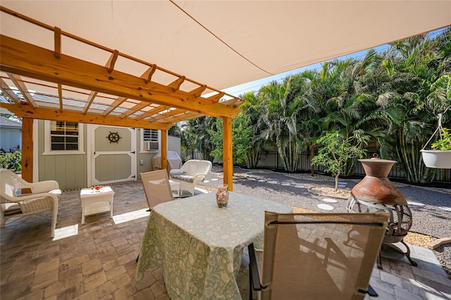 view of patio / terrace with a storage unit