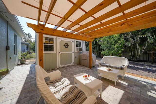 view of patio with a shed, grilling area, a pergola, outdoor lounge area, and cooling unit