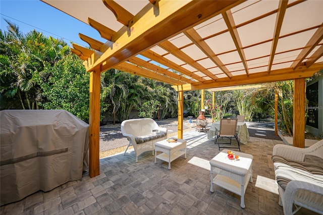 view of patio / terrace featuring a pergola, area for grilling, and outdoor lounge area