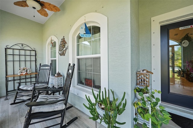 view of patio with a porch and ceiling fan