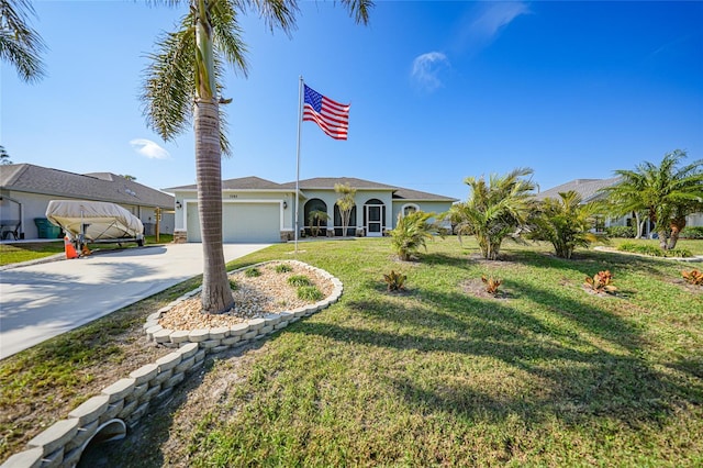 view of front facade featuring a front yard and a garage