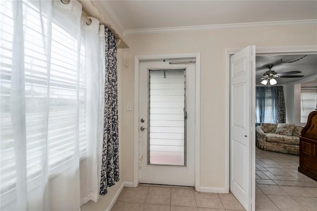 doorway to outside with ceiling fan, light tile patterned floors, and crown molding