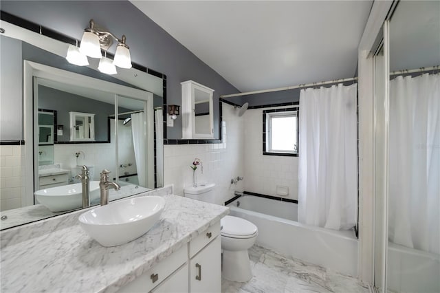 full bathroom with shower / bathtub combination with curtain, vanity, tasteful backsplash, toilet, and vaulted ceiling