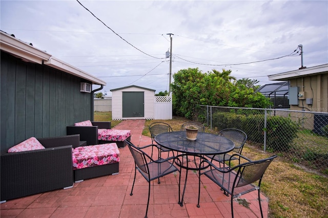 view of patio / terrace with a storage unit